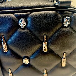 Black Quilted BeetleJuice crossbody  with Metallic Embellishments